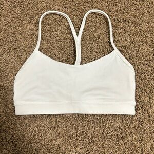 White flow Y lulu sports bra size 4